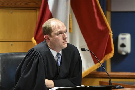 A judge hears arguments on revoking a Trump co-defendant’s bond in Georgia election subversion case